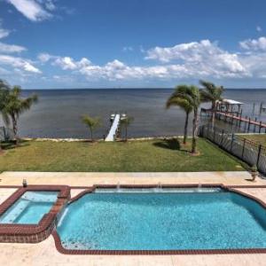 Riverfront titusville Resort Home with Infinity Pool