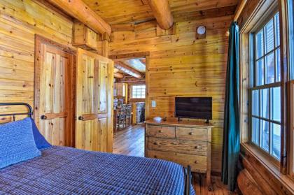 Quaint Lakefront Log Cabin with Dock and Kayaks