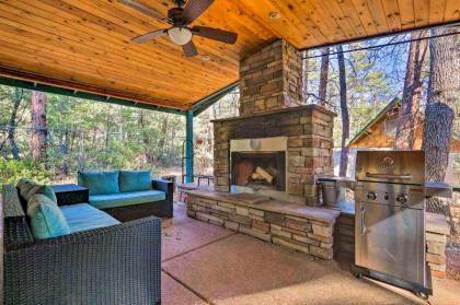 Pine House on Wooded Lot with Covered Patio and Deck! - image 11