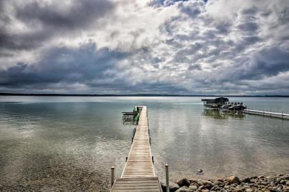 Higgins Lake Home with Dock Fire Pit and Deck!