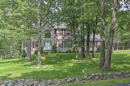 Poconos Home with Game Room Fireplace Deck and Hot Tub! - image 14