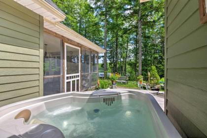 Calm Waterfront Great Pond Cottage with Hot Tub Deck - image 12