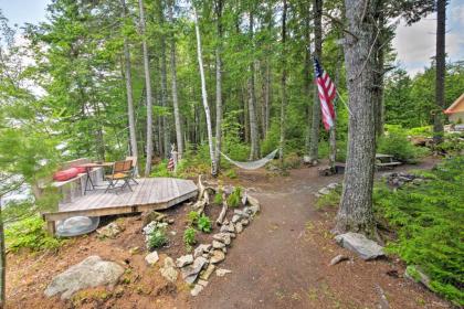 Calm Waterfront Great Pond Cottage with Hot Tub Deck - image 7