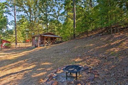 Open-Concept Cabin on Lake O the Pines with Deck! - image 12