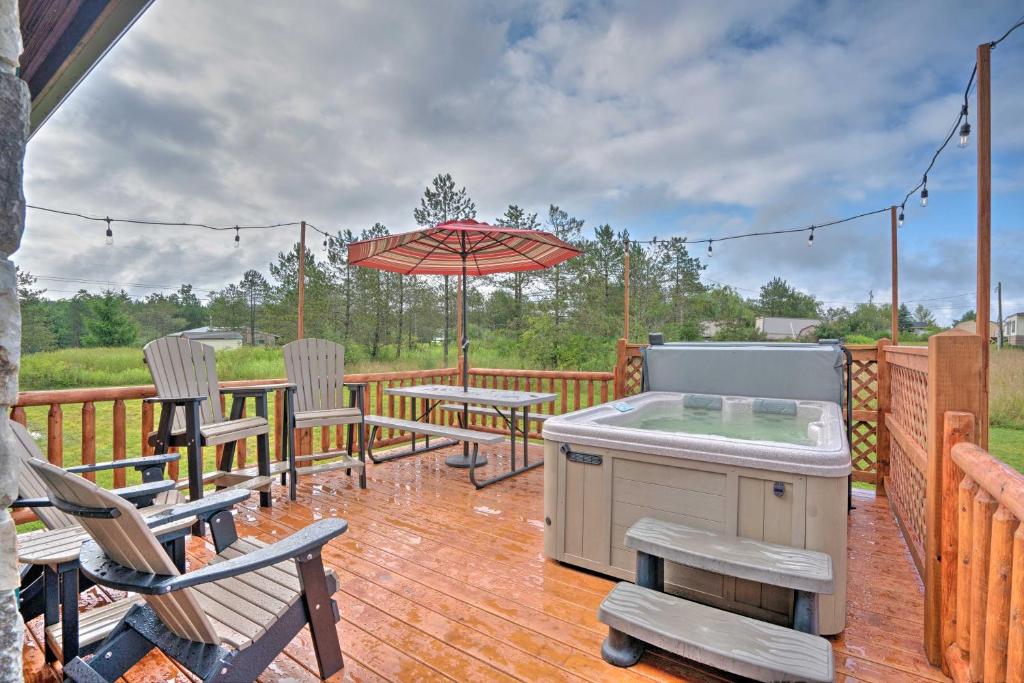 Rustic Benezette Cabin with Porch Hot Tub and Fire Pit - main image