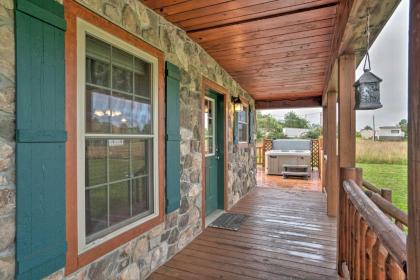 Rustic Benezette Cabin with Porch Hot Tub and Fire Pit - image 10