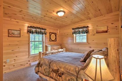 Rustic Benezette Cabin with Porch Hot Tub and Fire Pit - image 12