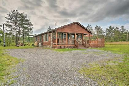 Rustic Benezette Cabin with Porch Hot Tub and Fire Pit - image 13