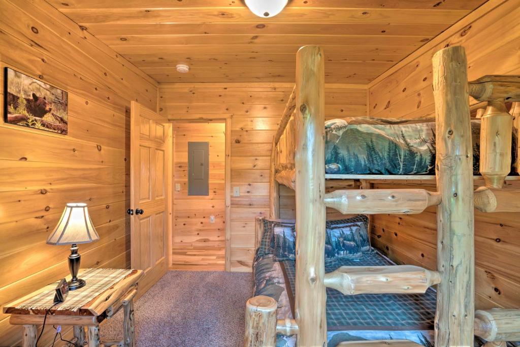 Rustic Benezette Cabin with Porch Hot Tub and Fire Pit - image 2