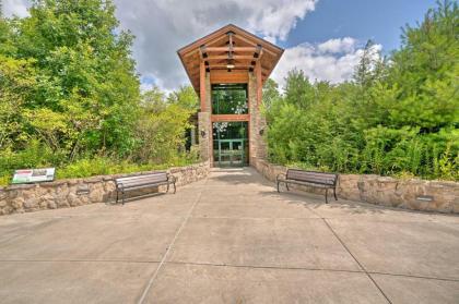 Rustic Benezette Cabin with Porch Hot Tub and Fire Pit - image 4