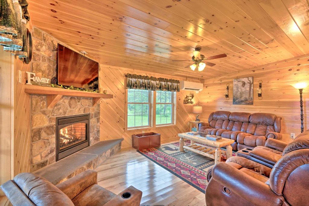 Rustic Benezette Cabin with Porch Hot Tub and Fire Pit - image 5