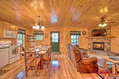 Rustic Benezette Cabin with Porch Hot Tub and Fire Pit - image 9