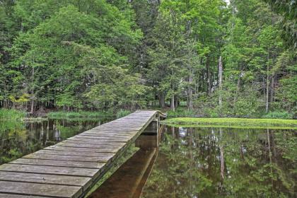 Secluded Birnamwood Cottage with Deck and River Views! - image 2