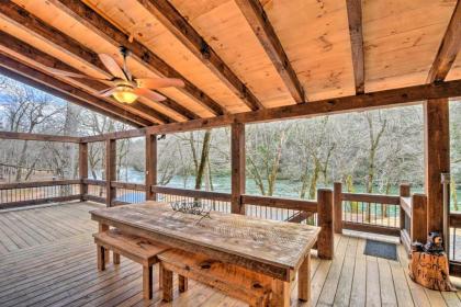 Trout-N-About Riverfront Cabin with Furnished Deck - image 9