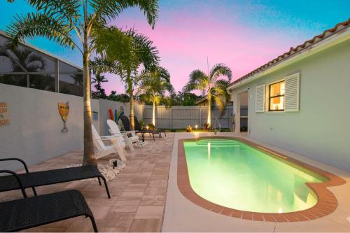 Charming Heated Pool Home - 3 miles to the Beach Pet and Family Friendly -Available Year Round! - main image