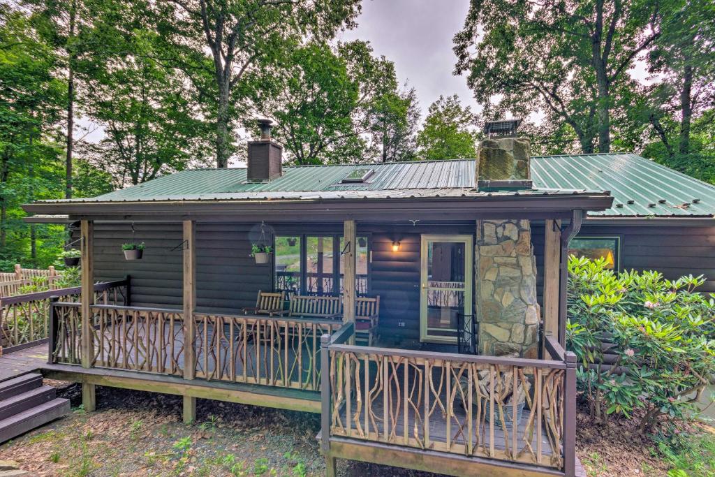 Quaint Cabin with Outdoor Fireplace and Sunroom! - main image