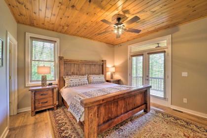 Woodsy Getaway with Hot Tub Deck and Mtn Views! - image 11