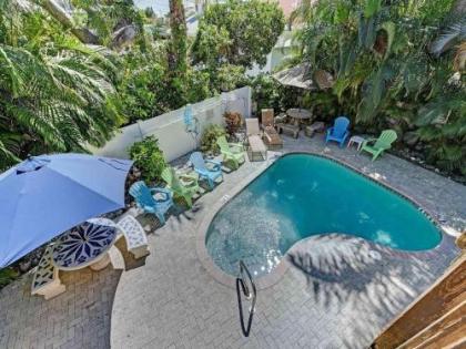 Ideal beach hideaway pool condo located between the island marina and beach - image 2