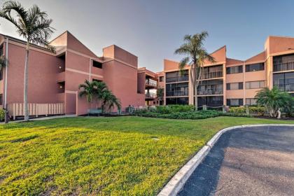 Quiet First-Floor Condo with Marina View and Pool