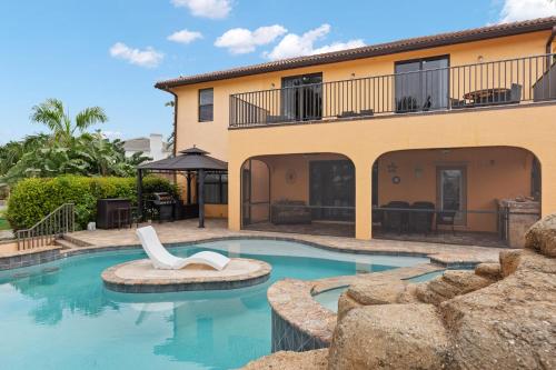 Stunning Waterfront Villa in Cape Coral with Lagoon Style Pool Spa and Boat Lift - main image