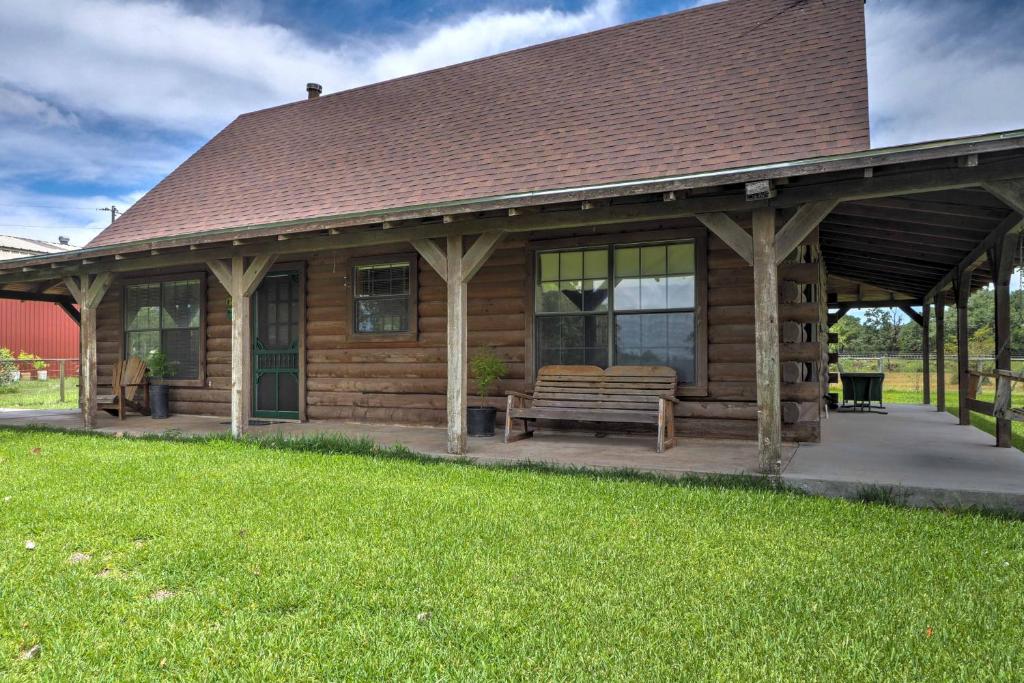 Rustic Carmine Log Cabin with Covered Porch on Farm! - main image