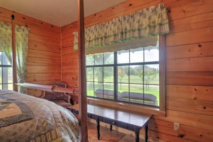 Rustic Carmine Log Cabin with Covered Porch on Farm! - image 4