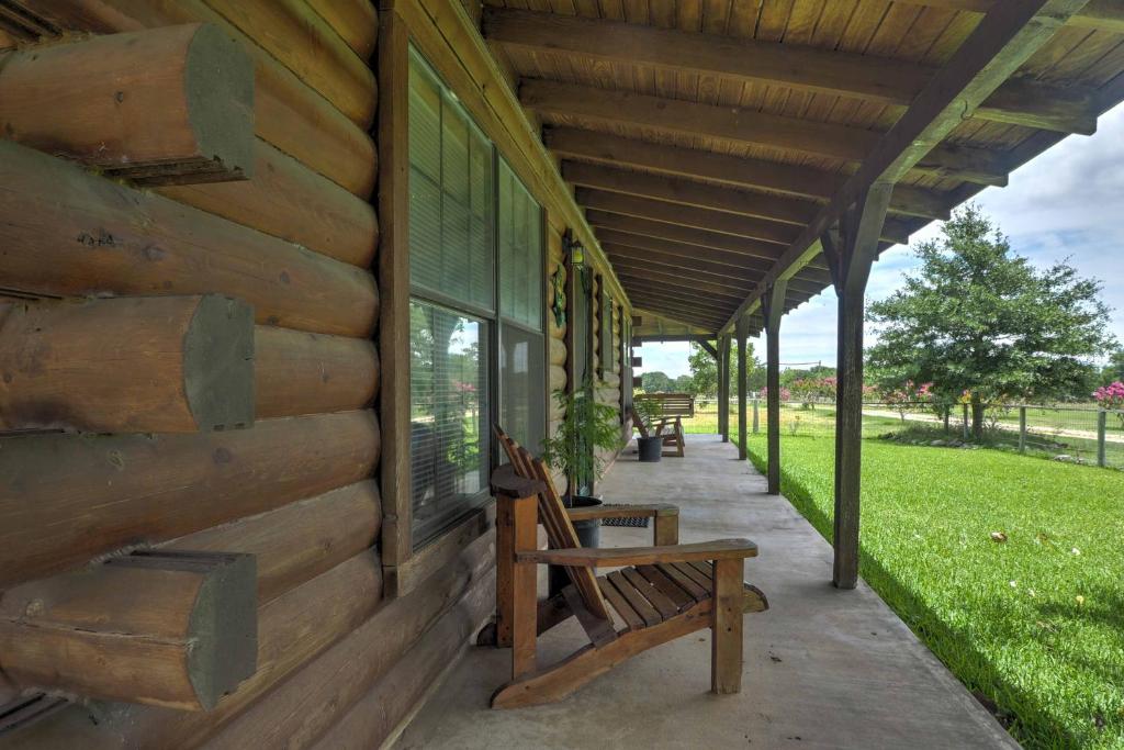 Rustic Carmine Log Cabin with Covered Porch on Farm! - image 6