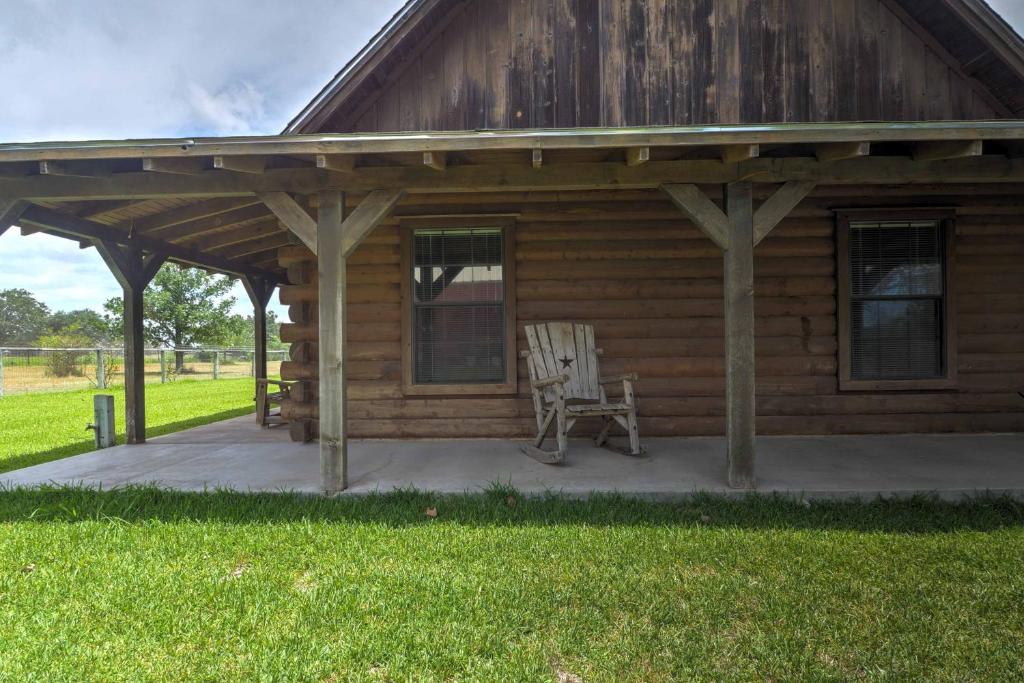 Rustic Carmine Log Cabin with Covered Porch on Farm! - image 7