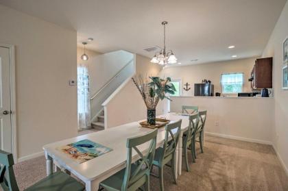 Modern Coastal Condo with Patio 1 Mi to Beaches - image 4