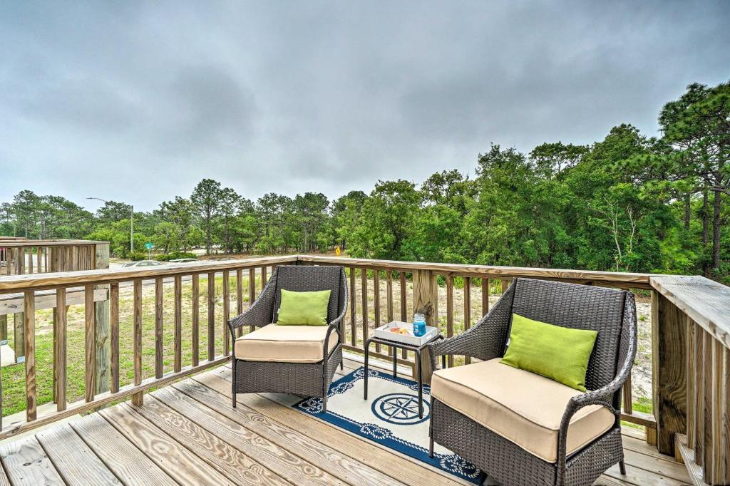 Modern Coastal Condo with Patio 1 Mi to Beaches - image 5