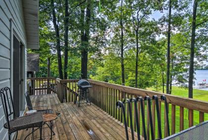 Cozy Carp Lake Cottage with Dock 4 Kayaks and Fire Pit - image 12