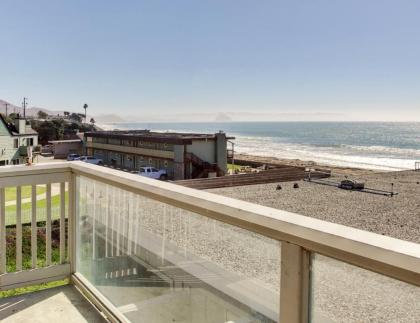 Oceanfront Condo Escape with Grill Walk to Beach!