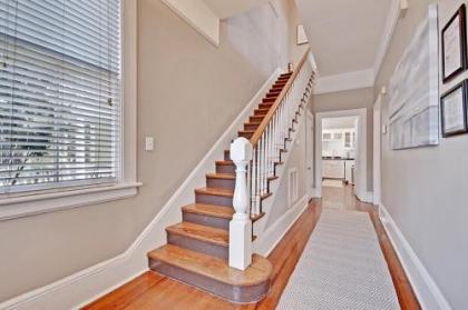 Soak Up the Light at a Chic 5BD Duplex Just 2 Blocks from King Street - image 3