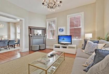 Soak Up the Light at a Chic 5BD Duplex Just 2 Blocks from King Street - image 4