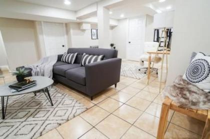 Trendy 1BR Basement with Laundry & Covered Parking - image 5