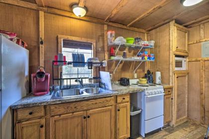 Cozy Cookson Cabin with Fire Pit 1 Mi to Lake! - image 11