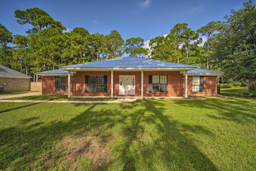 Updated Gulf Coast Home with Yard - Walk to Beach - main image