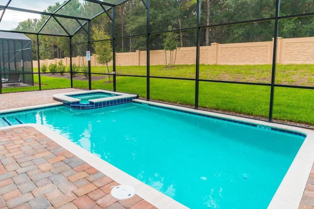 Blissful Getaway to Orlando With the Whole Family 2 Master Bedrooms Pool & Spa - image 2