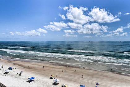 Beachfront Condo Walk to Pier and Dining! - image 3