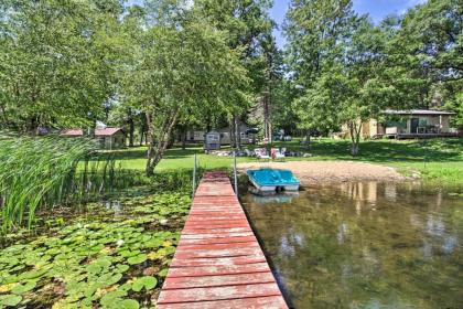 Waterfront Getaway with Beach Paddle Boat Fire Pit