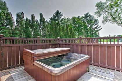 Lakefront Eau Galle Home with Hot Tub and Fire Pit - image 4