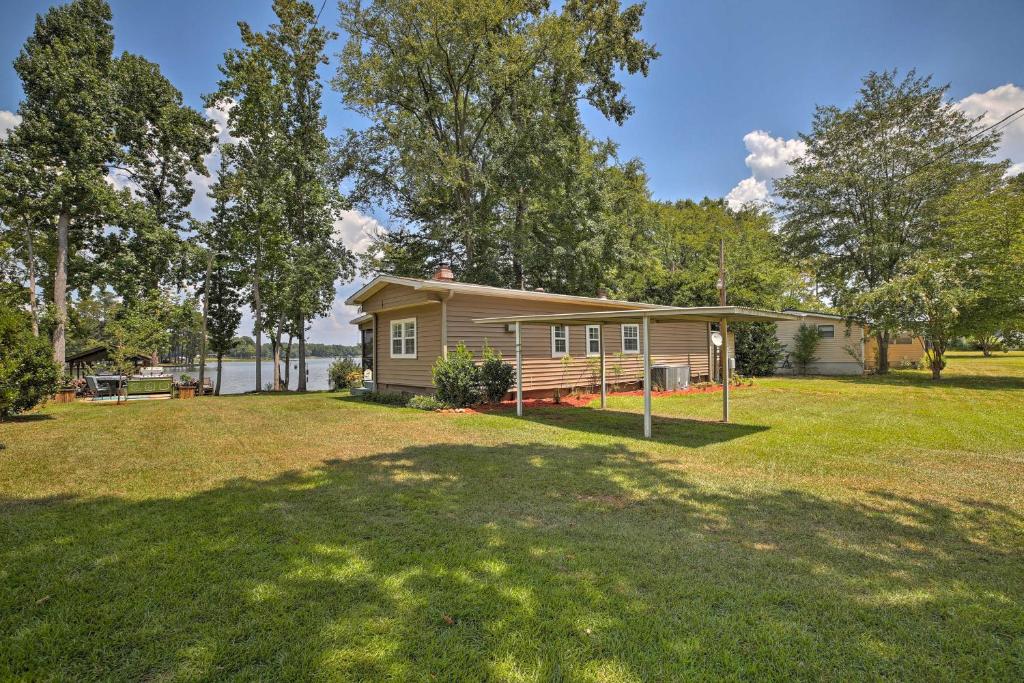 Lake Sinclair Waterfront Home with Fire Pit and Dock - main image