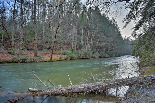 Riverfront Rosewater Cabin with Hot Tub Game Room! - image 5