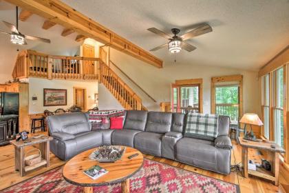 Spacious Riverfront Retreat with Deck and Hot Tub - image 5