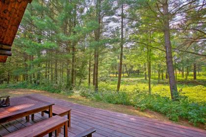 Secluded Log Cabin in NW Michigan with Fire Pit and Deck - image 12