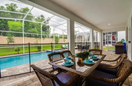 Elegant Centerpiece Pool Retreat in Champion Gates Florida