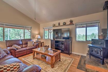 Hilltop Haven with Wraparound Deck and Peak Views - image 9