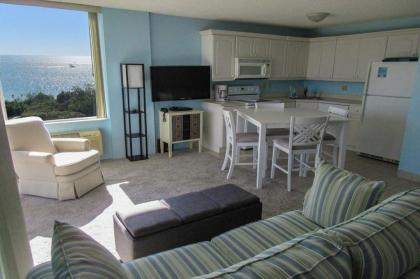 Estero Beach  tennis 503C by Kathy Nesbit Vacations Fort myers Beach Florida