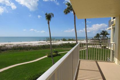 Estero Beach  tennis 205A by Kathy Nesbit Vacations Florida