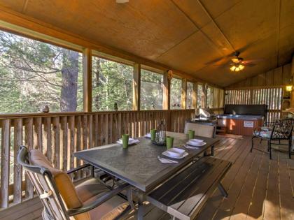 Cozy Nest - Gatlinburg Cabin with Porch and Jacuzzi! - image 2